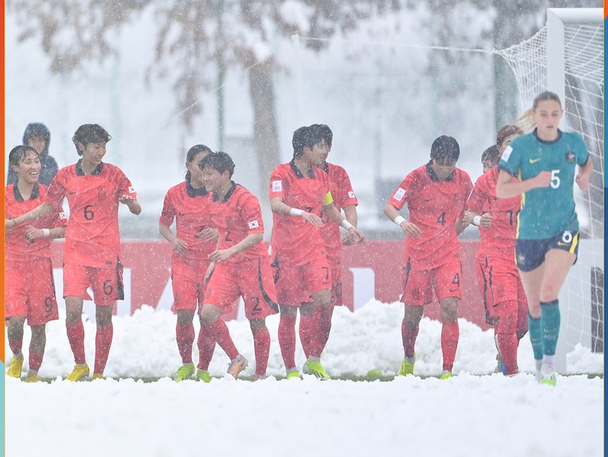 Players from South Korea and Australia during a game at the U20 Women's Asian Cup in Tashkent, Uzbekistan on March 3, 2024 played in the snow