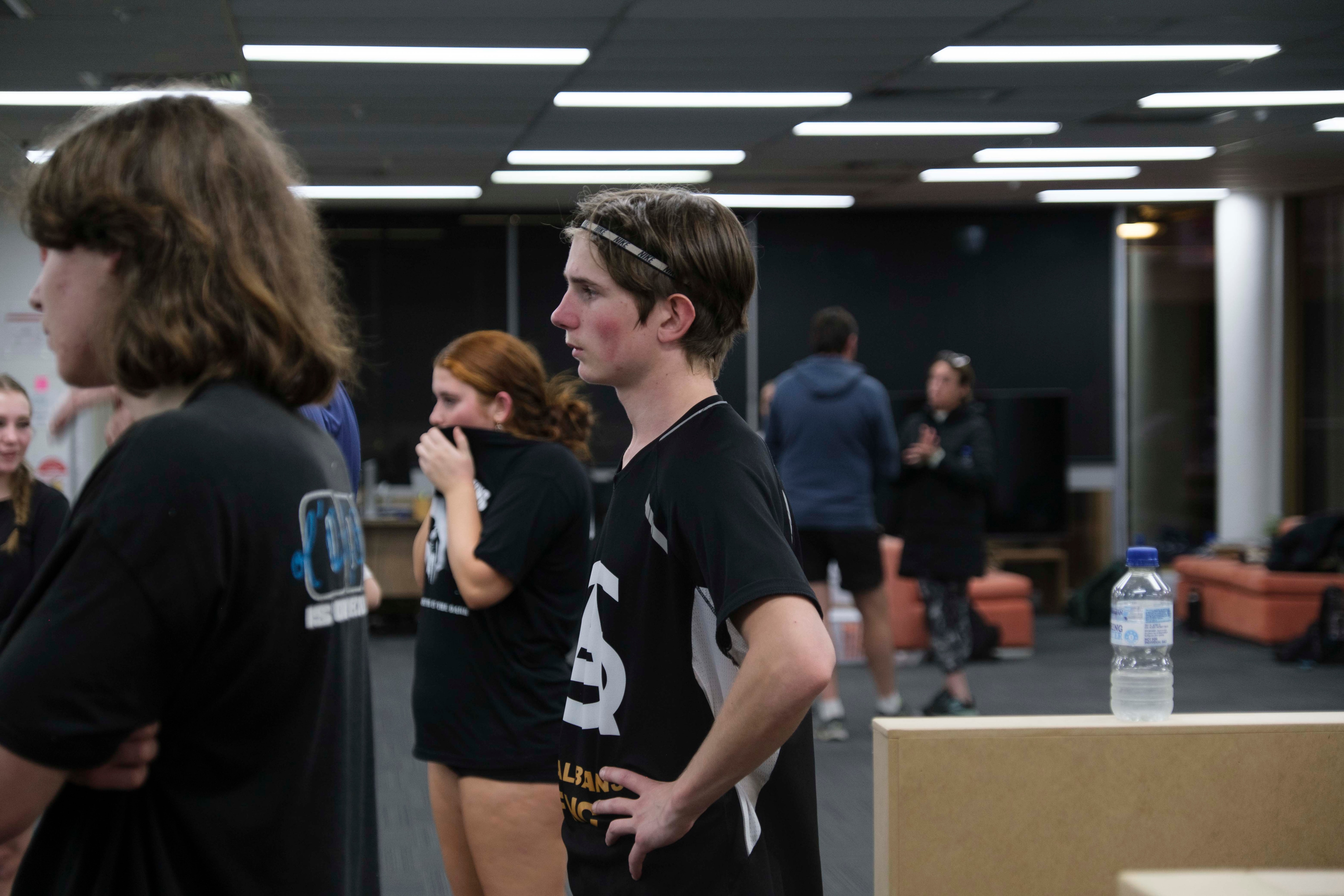 Students exercising at the beach and running up hills training for the Kokoda Track