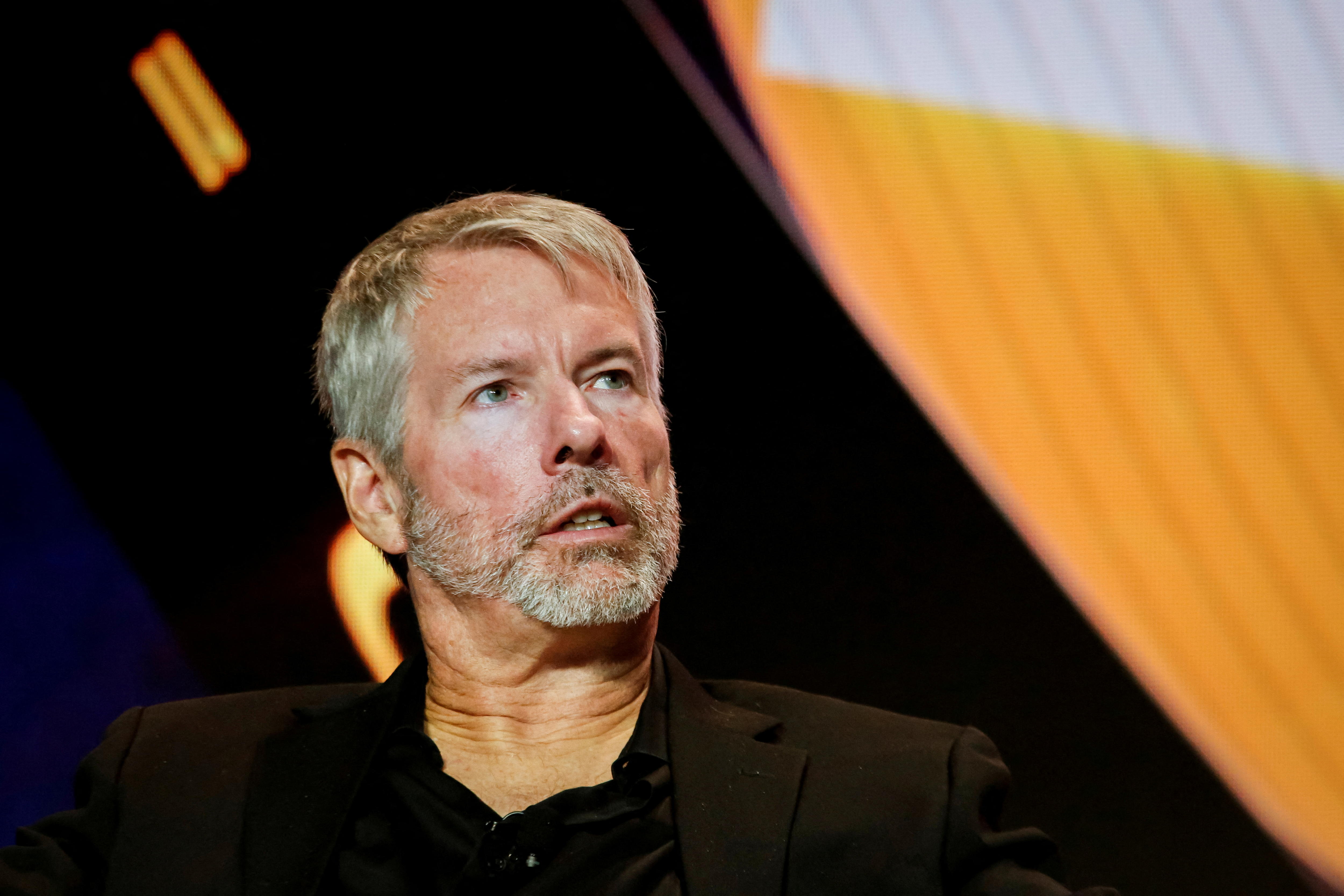 Michael Saylor on stage at a Bitcoin conference
