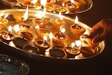 Candles and fireworks are used to celebrate Diwali, the festival of lights.