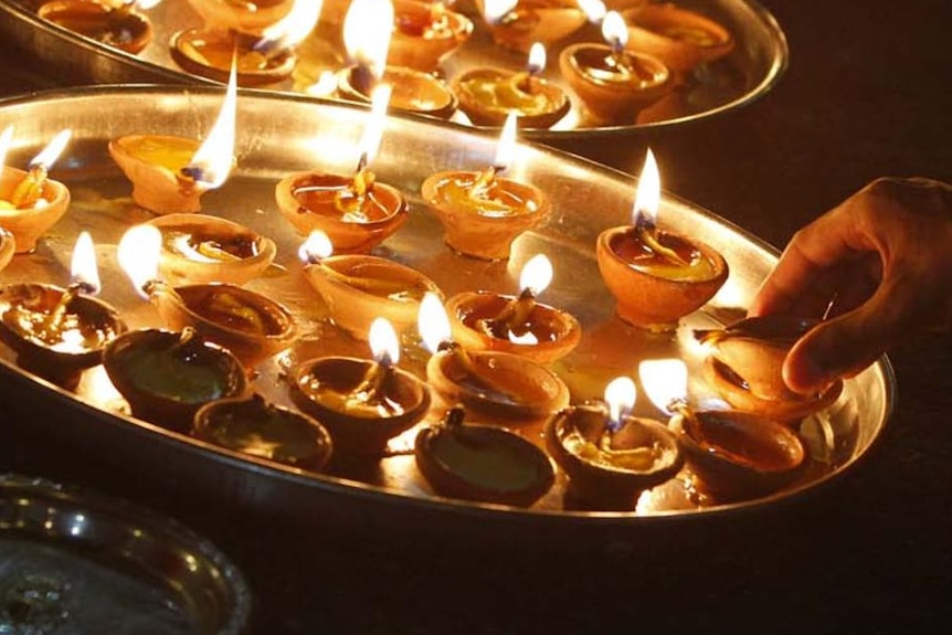 Candles and fireworks are used to celebrate Diwali, the festival of lights.