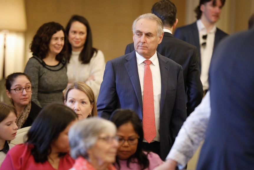 Don Farrell stands inside a formal room at Government House