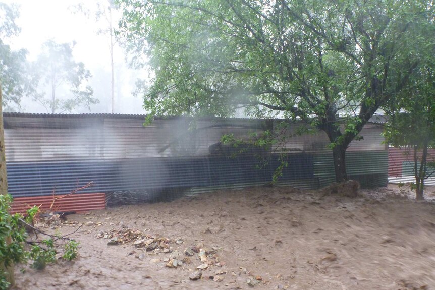 The third downpour of rain in a week sent a river of mud through Kay Bridge's shed.