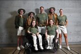 Seven members of the Australian Paralympic team pose wearing the formal uniform for the Paris Paralympics.