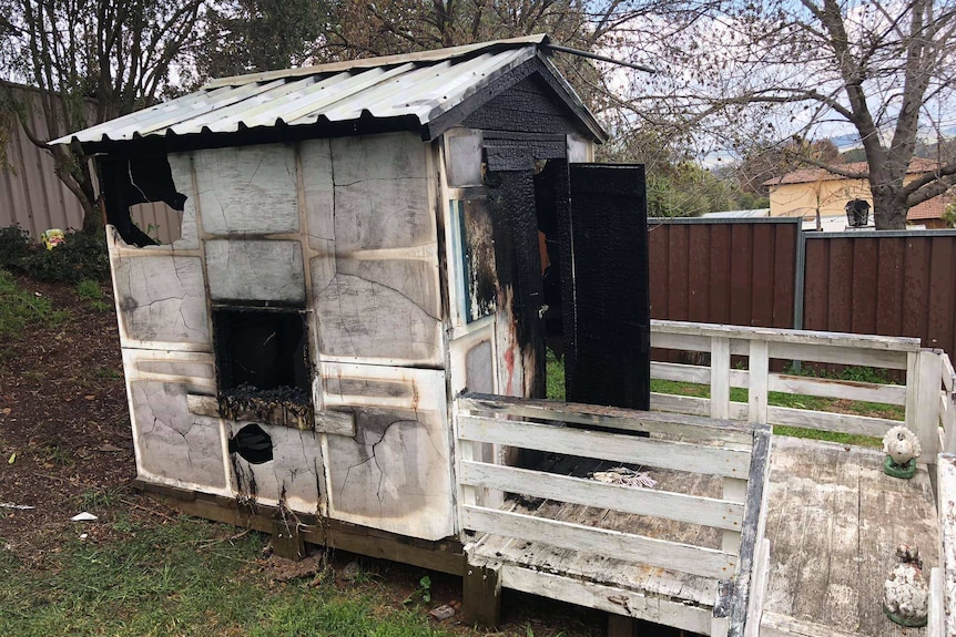 Cubby house burnt and damaged