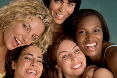 A group of multi-ethnic women smiling
