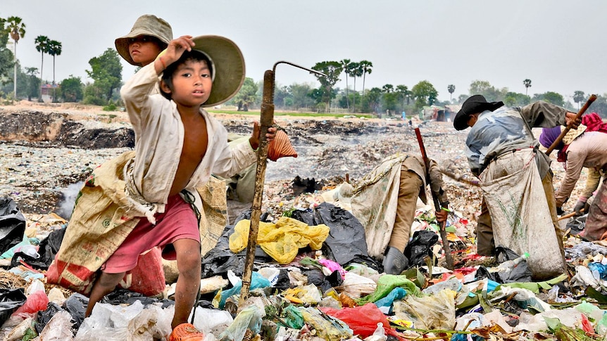 Sifting for food at a Cambodian rubbish dump