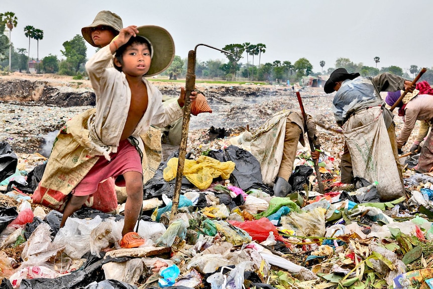 Sifting for food at a Cambodian rubbish dump