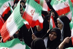 Iranian citizens at a rally in Tehran (AFP: Atta Kenare)