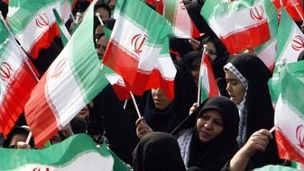 Iranian citizens at a rally in Tehran (AFP: Atta Kenare)