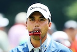 Jason Day eats his putter