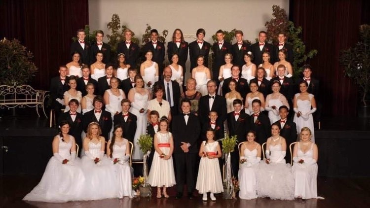 Group shot of debutante ball attendees