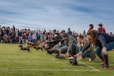 Dachshund dogs race in front of a crowd at the Dachshund Dash in Port Fairy, Victoria.
