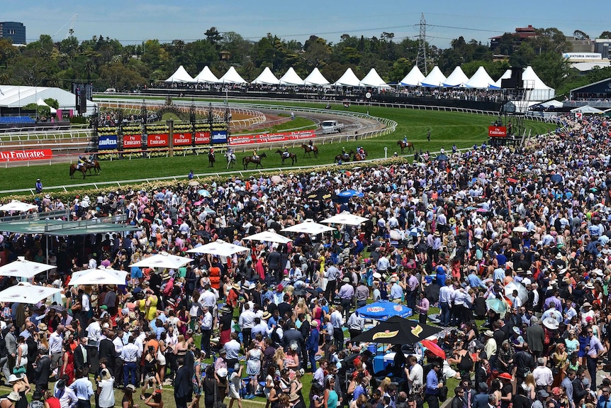 The crowd gathers at Flemington racecourse on Melbourne Cup day.