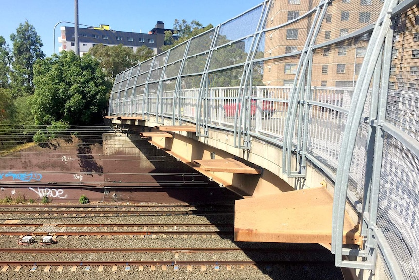 A road bridge over train line in Granville.