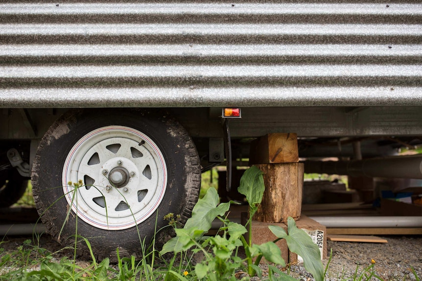 The tiny house's wheels.