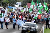 Crowd marching against the end of self-government on Norfolk Island.