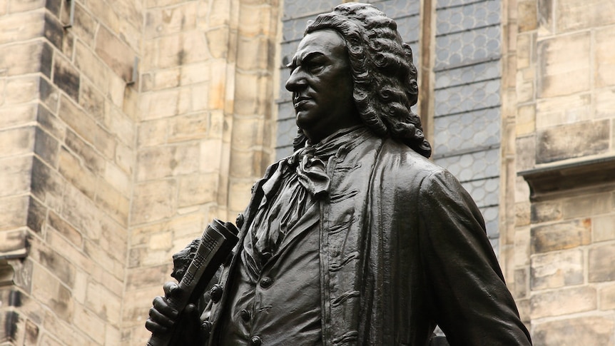 statue of J.S. Bach outside church