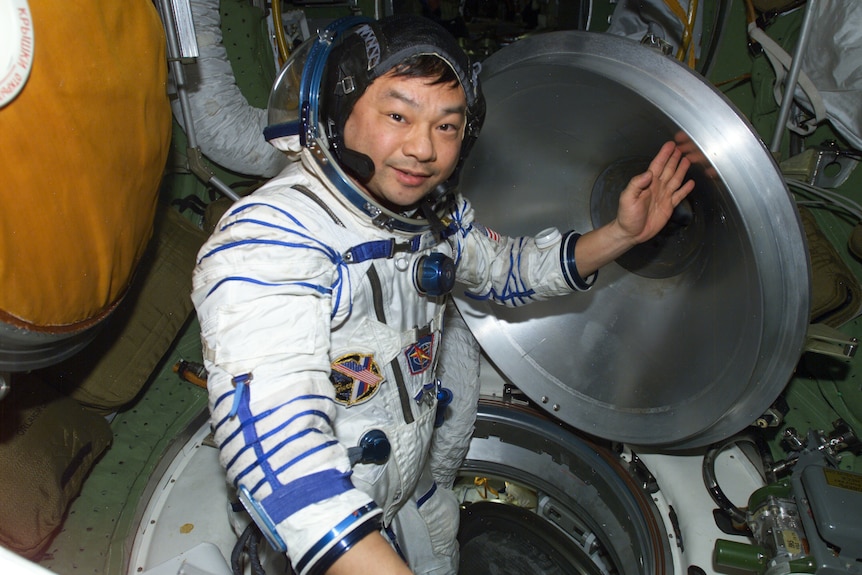 Former NASA astronaut, Leroy Chiao, wearing a Russian Sokol spacesuit