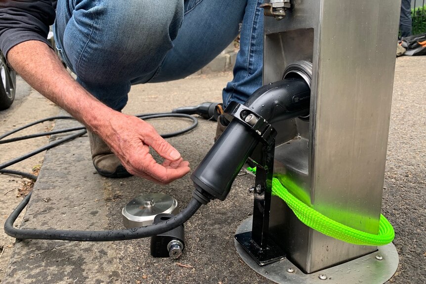 A kerb charger for an electric vehicle.