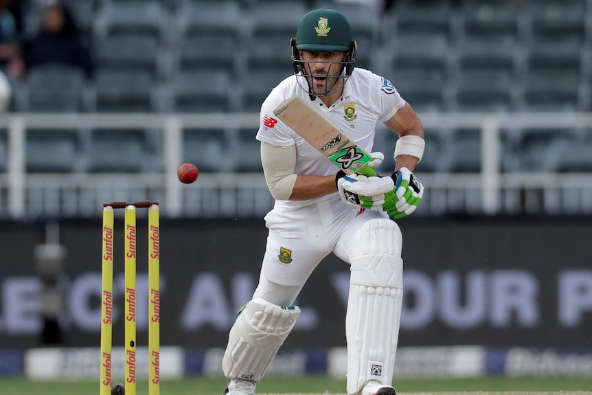 South Africa's Faf du Plessis watches the ball after playing a defensive shot