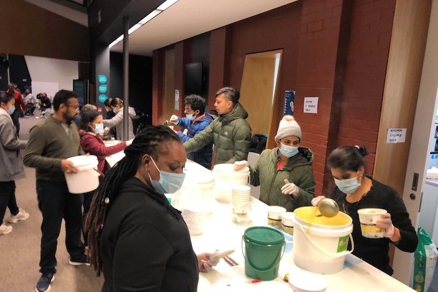 Students preparing food.