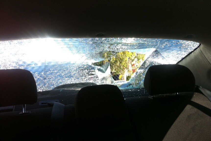 Uber car window smashed after attack