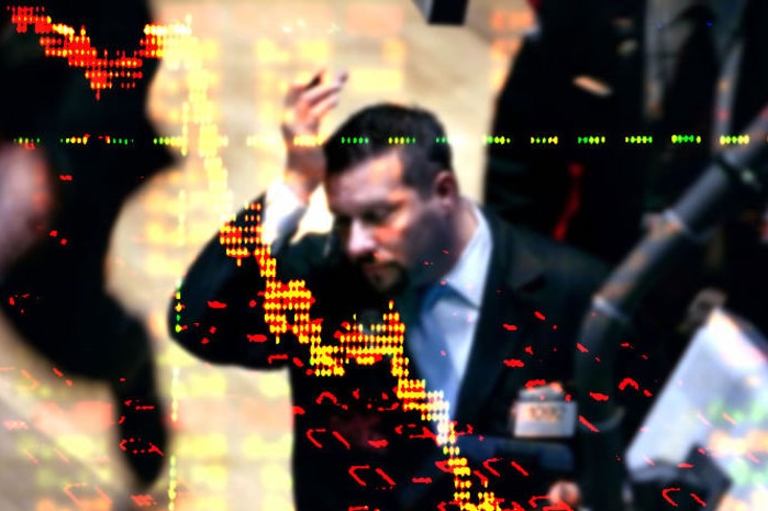 Downcast stockbroker with graphic overlay (ABC News)