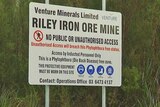 A sign at the site of Venture Minerals' proposed iron ore mine at Riley Creek on Tasmania's west coast.
