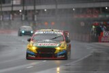 Chaz Mostert of Supercheap Auto Racing drives in the wet at the Gold Coast 600 on October 21, 2017.