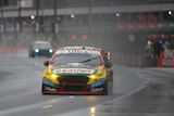 Chaz Mostert of Supercheap Auto Racing drives in the wet at the Gold Coast 600 on October 21, 2017.