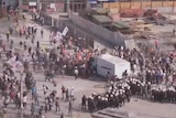 Protesters and riot police clash in Taksim Square in Istanbul