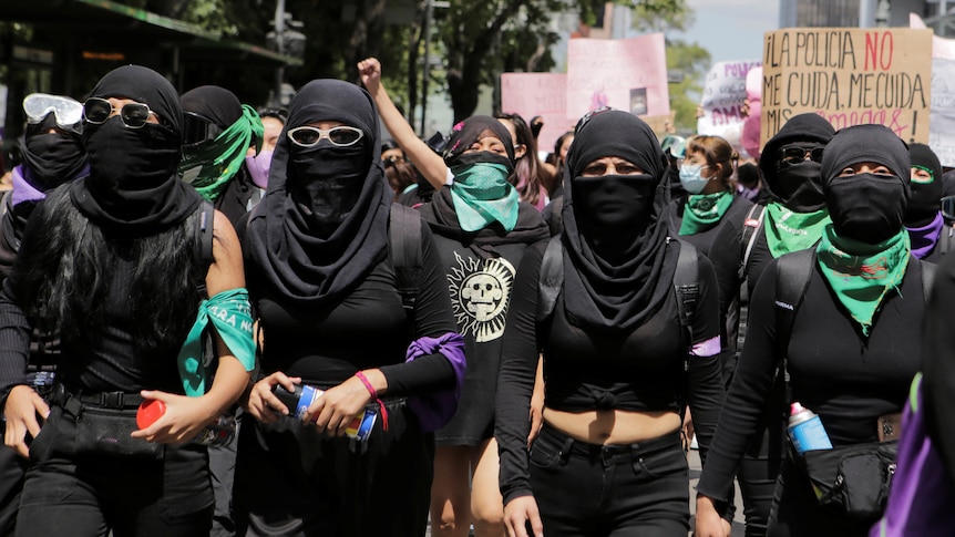Women take part in a protest in support of Victoria Salazar, a Salvadoran woman.