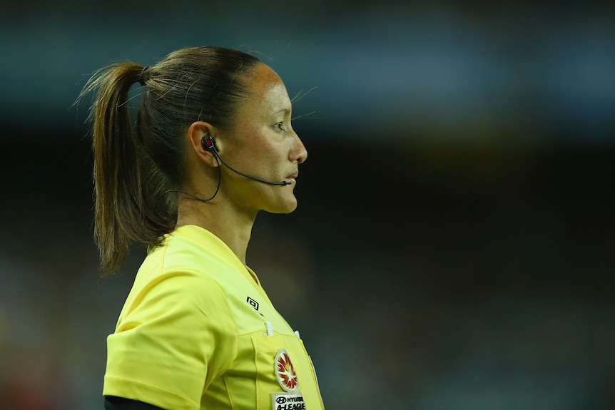 assistant referee Sarah Ho