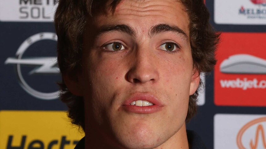 Young Viney faces the media