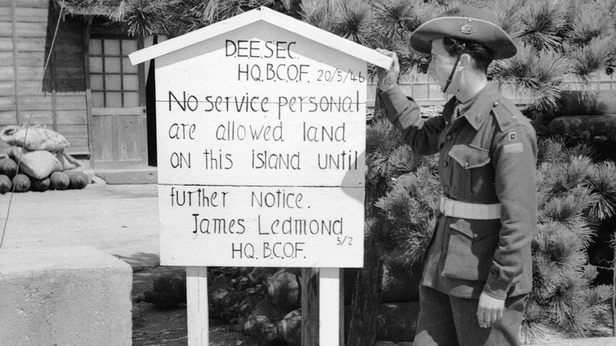 Squadron leader JP Redmond with misspelling on sign