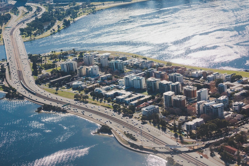 An aerial photo of Perth including the Narrows Bridge taken from a plane