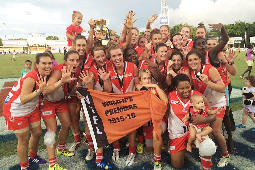 The Waratah women's AFL team celebrate their 2016 NTFL win.