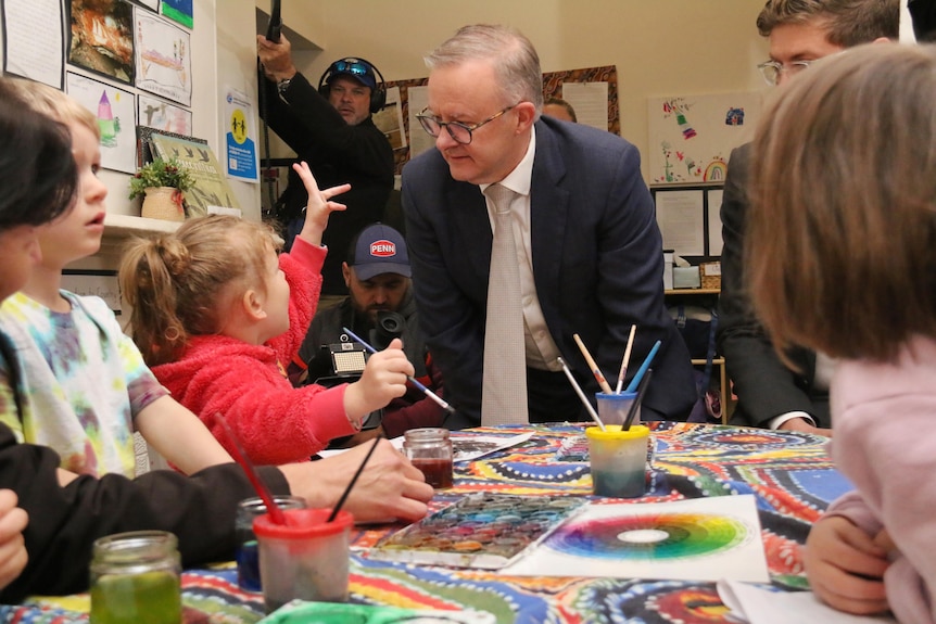 Anthony Albanese with children at a daycare. 