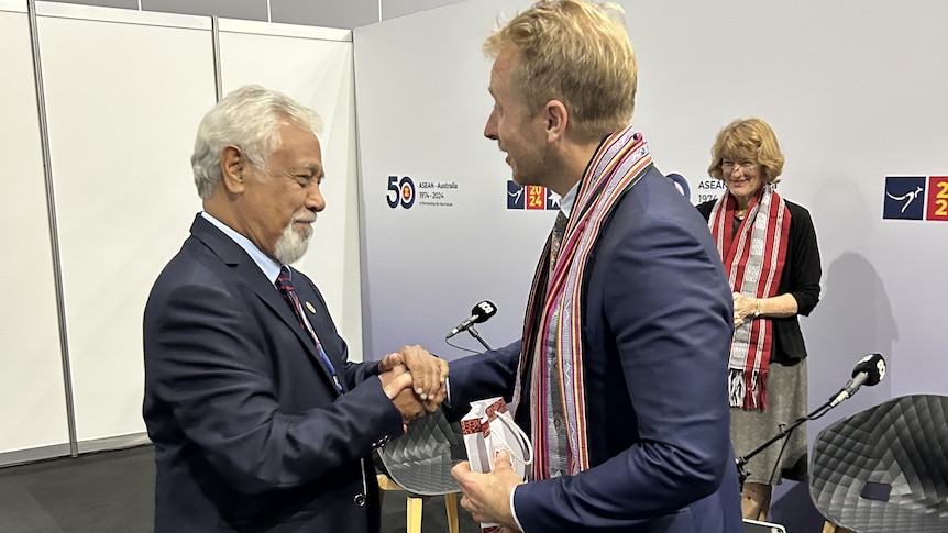 Prime Minister of Timor-Leste Xanana Gusmão shakes hands with Hamish Macdonald