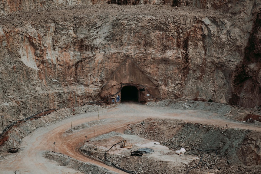 The view from a lookout at a gold mine showing the entrance to an underground portal.