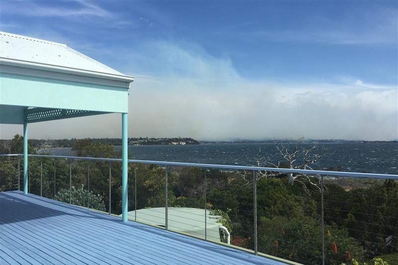 View of bushfire smoke from a balcony near St Helens