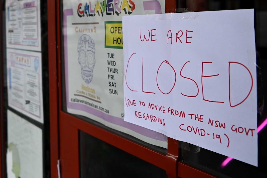 Signage at a restaurant now closed on King Street in Newtown in Sydney.