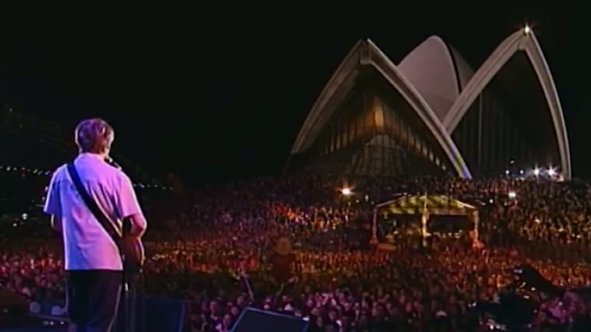 Crowded House plays on the steps of the Sydney Opera House in 1996.