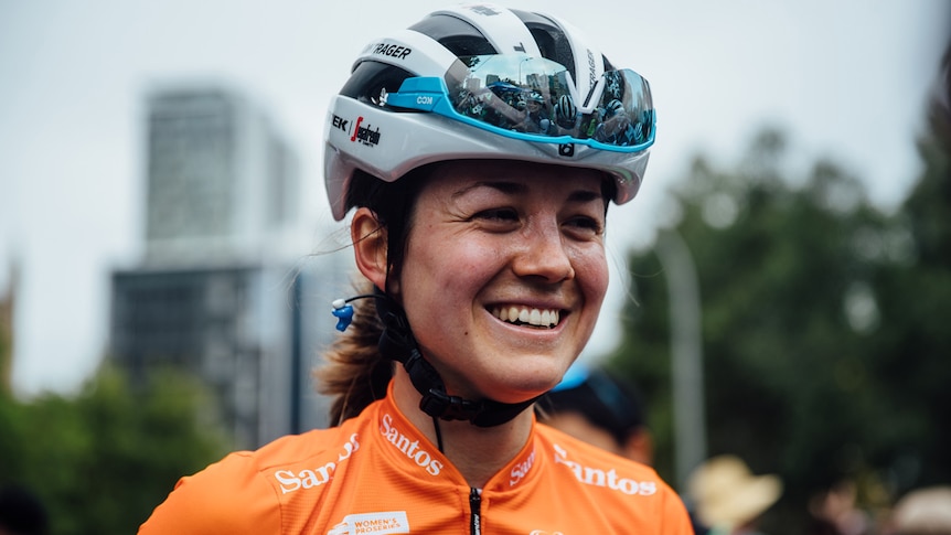 Headshot of cyclist Ruth Winder smiling at the Santos Tour Down Under in Adelaide.