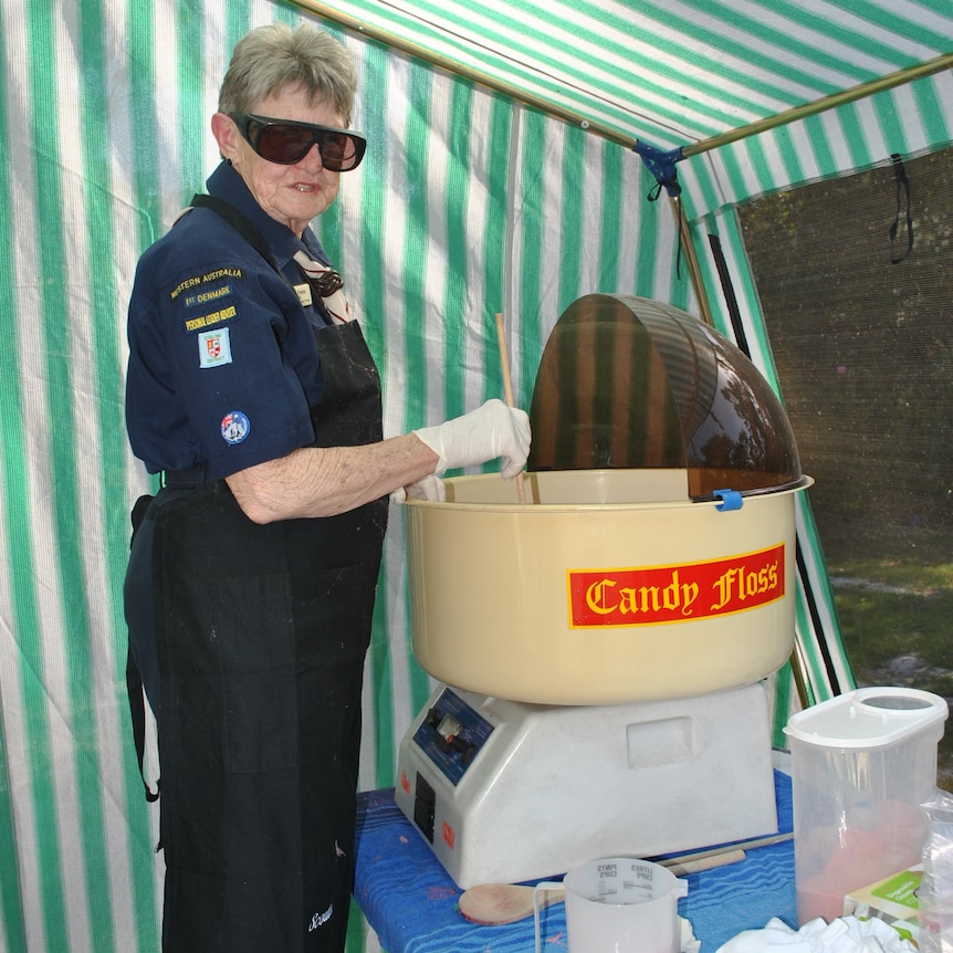 woman at a candy floss machine