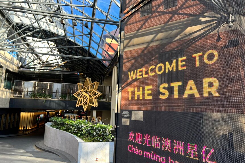 A display screen that says 'Welcome to The Star' outside a building.