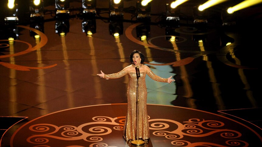 Shirley Bassey sings at the Oscars.
