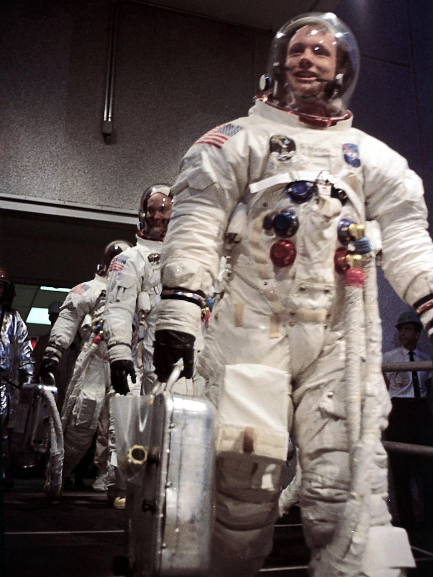 Apollo 11 commander Neil Armstrong at Kennedy Space Centre in Houston with other crew members Michael Collins and Edwin Aldrin.