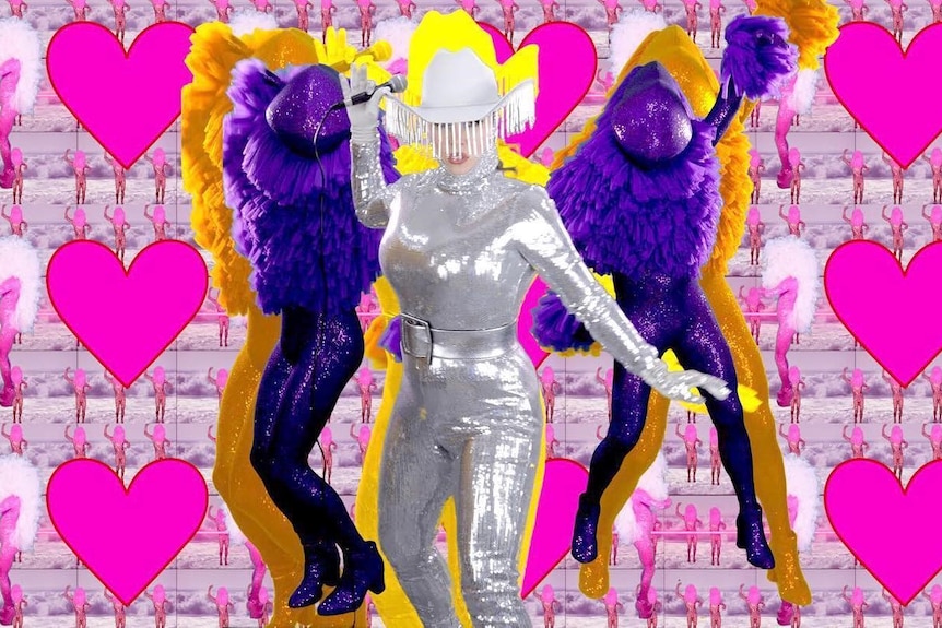 A woman dressed in sequins with two purple people next to her